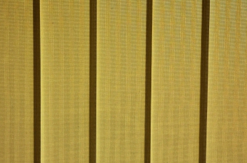 Pleated Vertical Blinds. Made to measure pleated vertical window blinds, supplied and fitted by Bargain Blinds, Torquay. Bargain Blinds installs pleated vertical blinds in the following areas around Torbay in Devon; vertical blinds Paignton, fitted vertical blinds Brixham and we also fit vertical blinds in Teignmouth to.